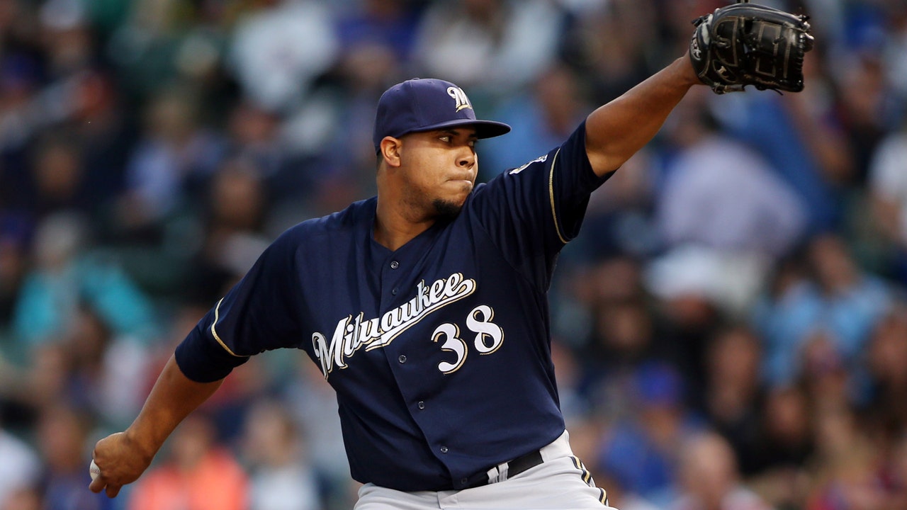 Cubs claw past Peralta, Brewers again